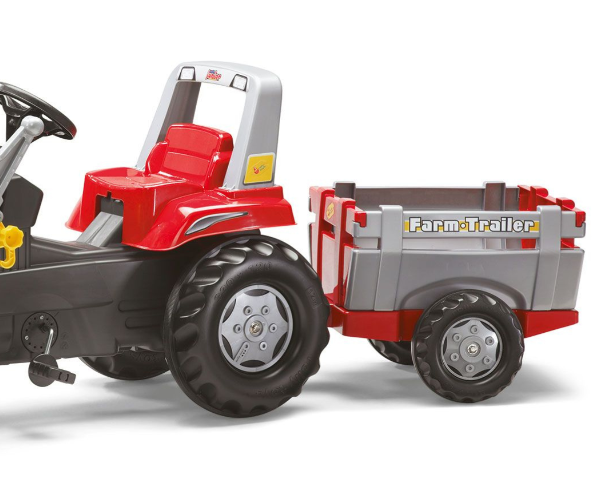Rolly Junior RT mängutraktor haagise ja esilaaduriga, ideaalne liiva ja mänguasjade vedamiseks.