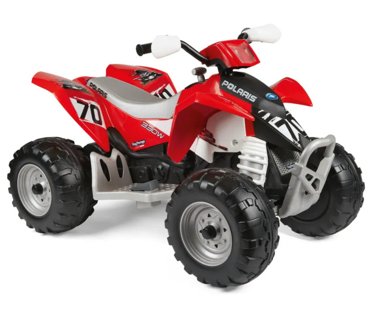 Laste elektriline ATV Peg Perego Outlaw punases värvitoonis murul seismas