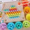 Montessori puidust värviliste kuulide õppemäng pulkadega