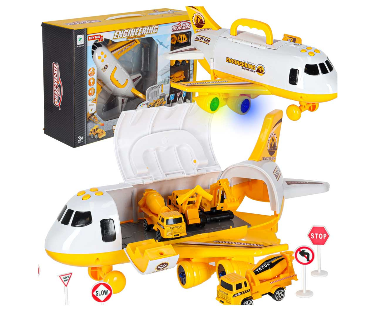 Punane transpordilennuk tuletõrje sümbolitega, tiivad ja sabakaldtee nähtaval.