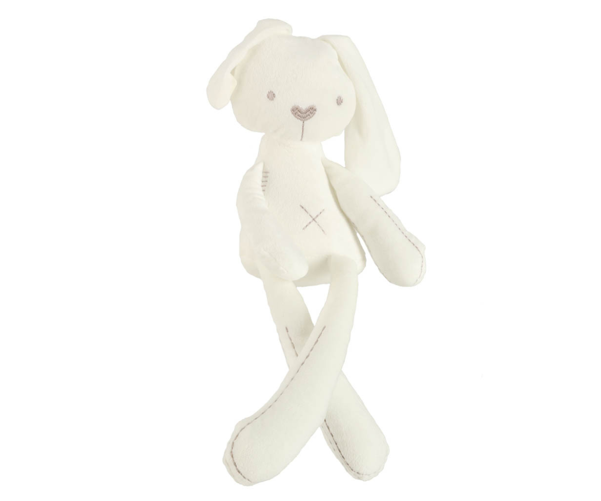 Valge plüüsjänes detailse viimistlusega lastetuppa