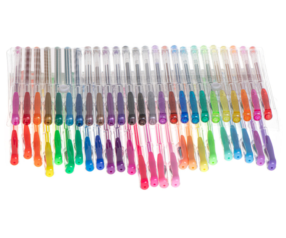 Sädelevad glitter-geelpliiatsid ja metalliktoonid laotatuna lauale