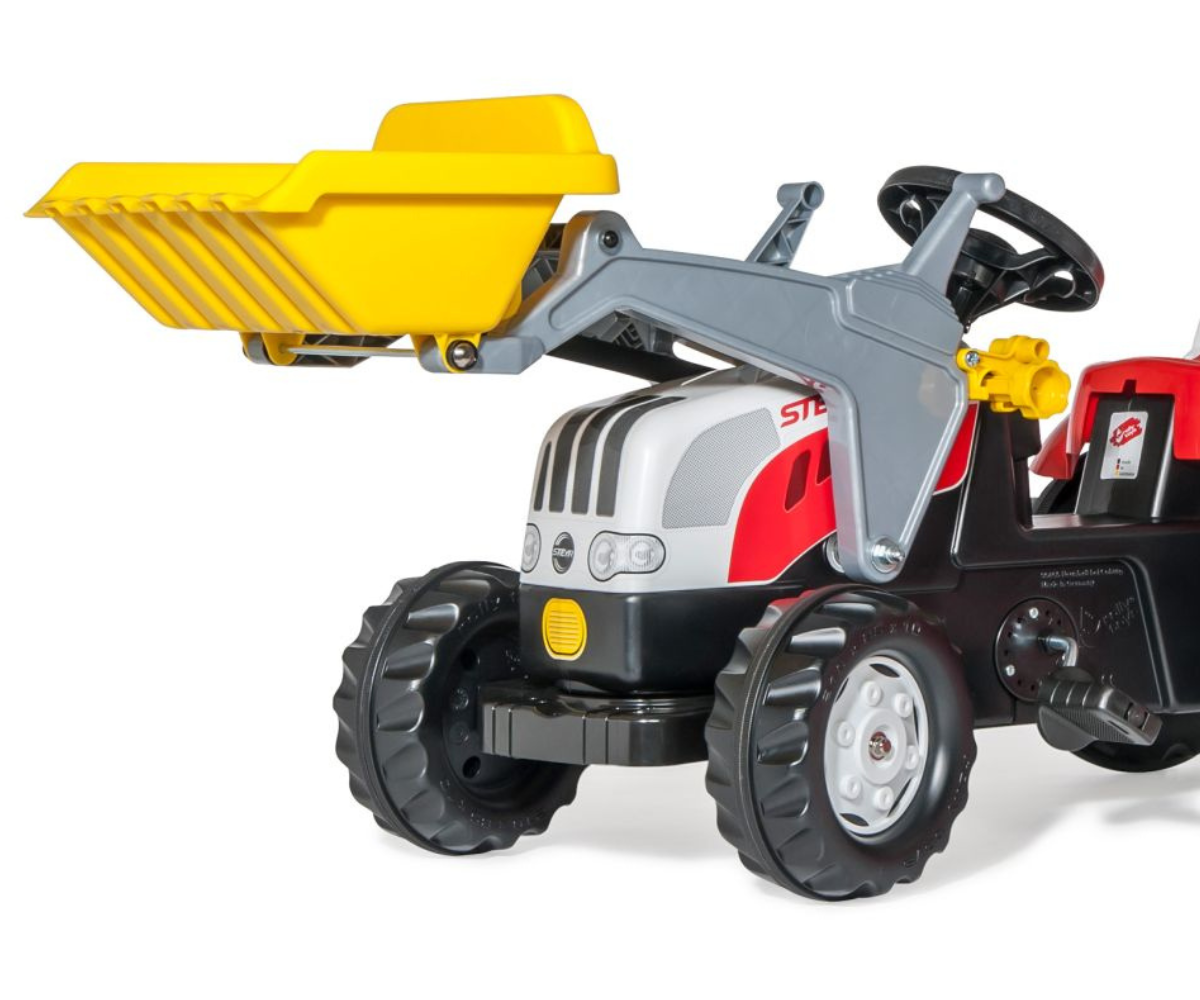 Laste pedaaltraktor Steyr haagise ja esilaaduriga, sobib vanusele 2,5–5 aastat.