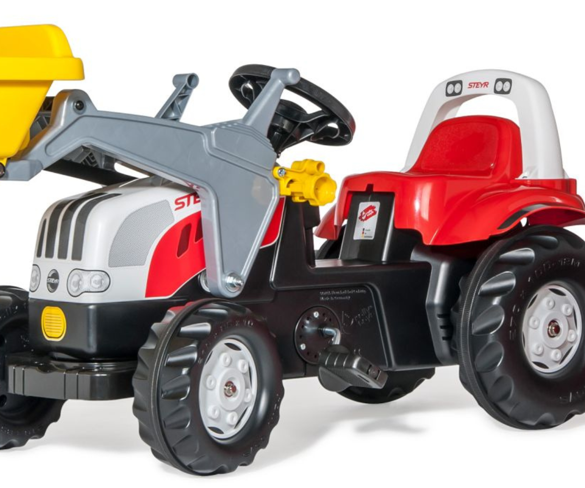 Rollykid Steyr pedaaltraktor kopa ja järelkäruga, punane laste traktor õues mängimiseks.