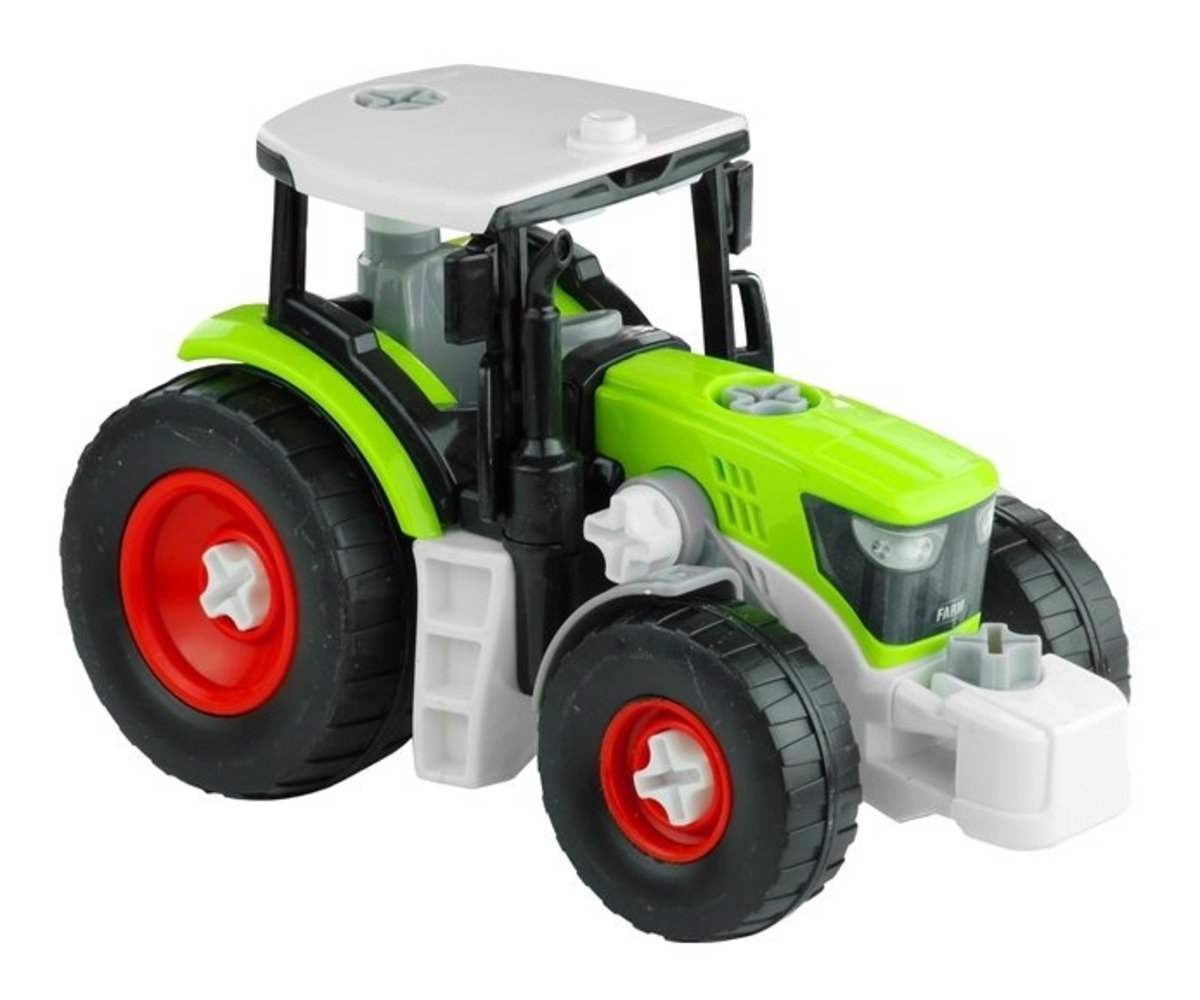 Detailne vaade traktorile osana komplektist traktor ja haagis puidu transportimiseks.