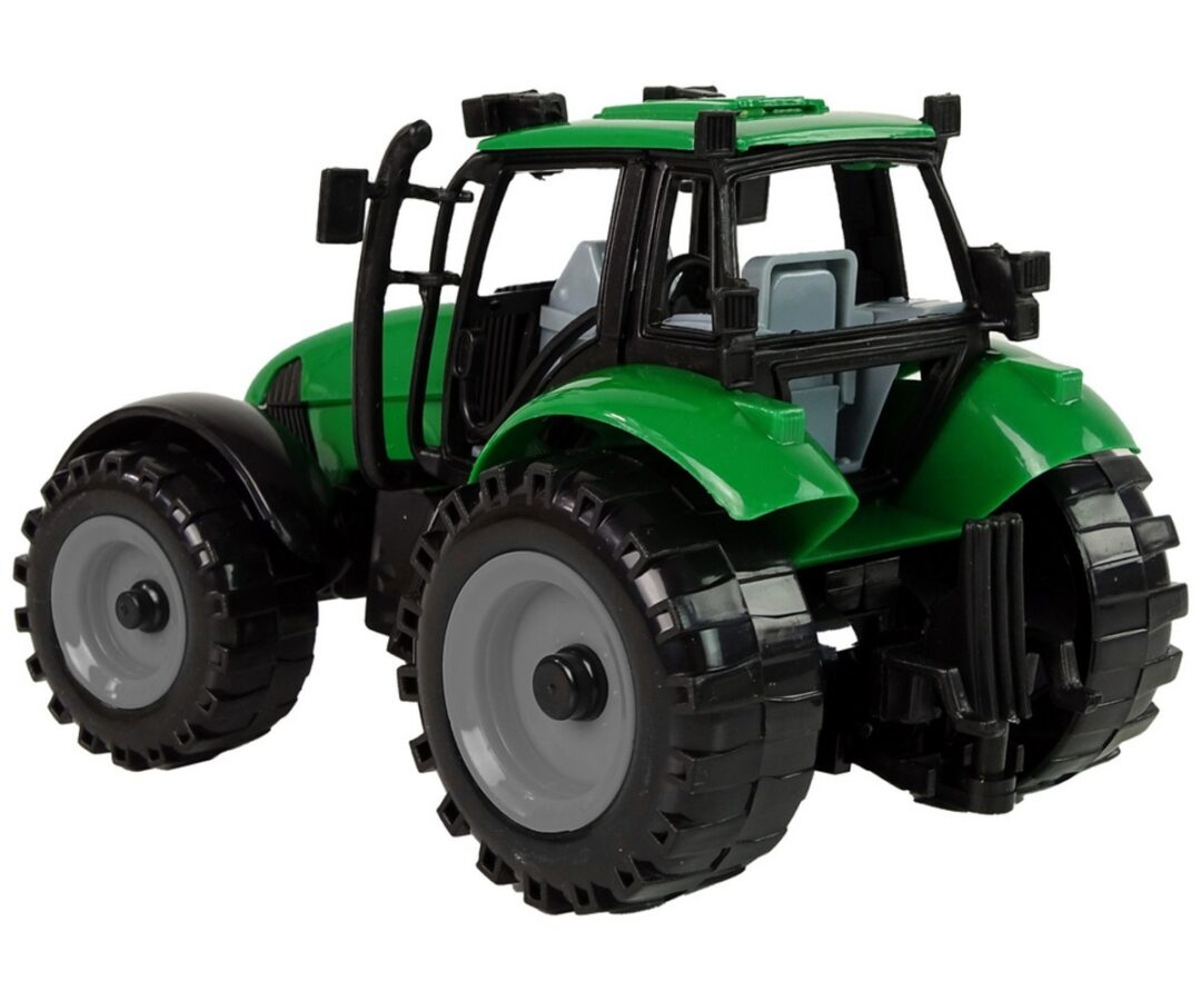 Traktor Ideal Farm Green avaneva kapotiga tagantvaade, näidates selle detailset disaini ja mustreid.