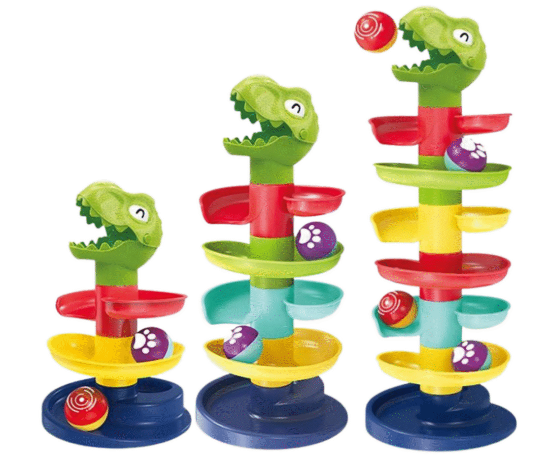 Kolm rohelist dinosauruse libisemistorni pallidega, ideaalne lastemängudeks.