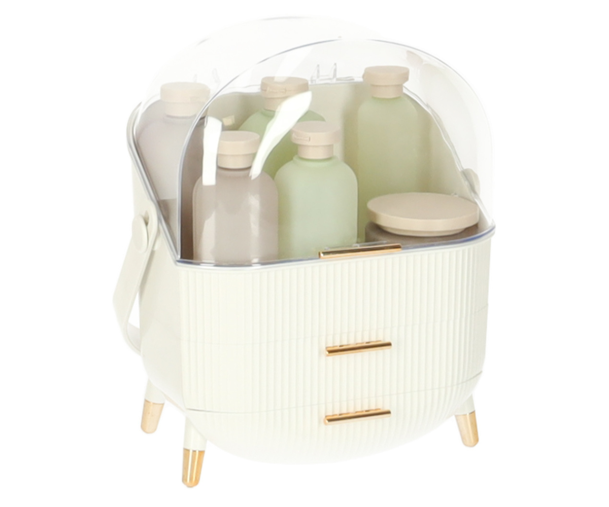 kahe sahtliga kosmeetikakast kuldsete detailidega