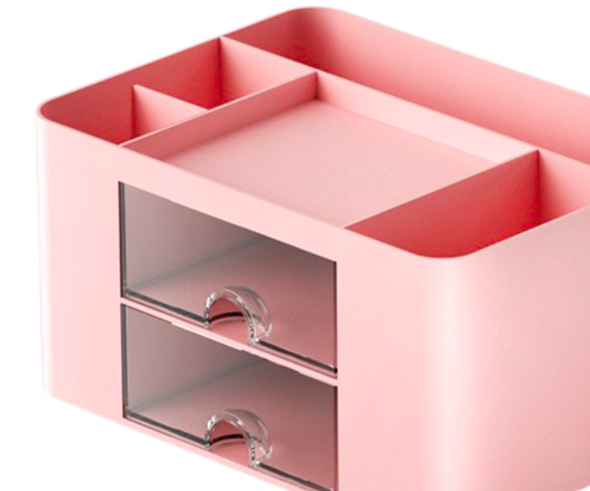 Roosa lauakorrastaja sahtlitega – stiil ja praktilisus ühes, näidates sahtlite struktuuri ja ülemist korraldamist.