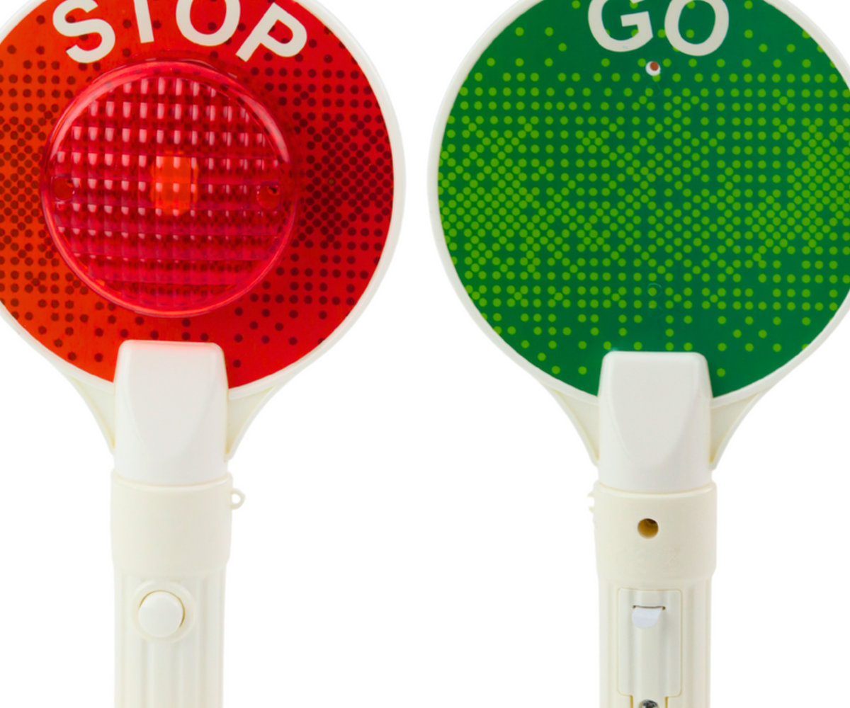 Punane ja roheline valgussignaal Politsei stop/go valgussignaal lastele