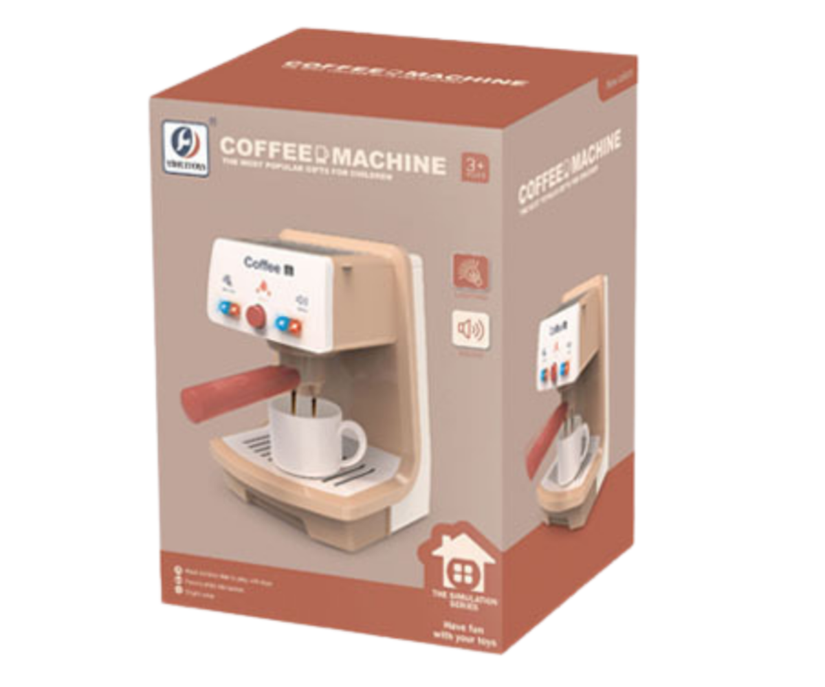 Kohvimasin helide ja tuledega pakendi detailvaade, koos masina ja tarvikutega.