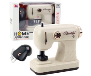 Mänguõmblusmasin hiirega – valgus- ja heliefektidega, ühes kohandatud pakendis.