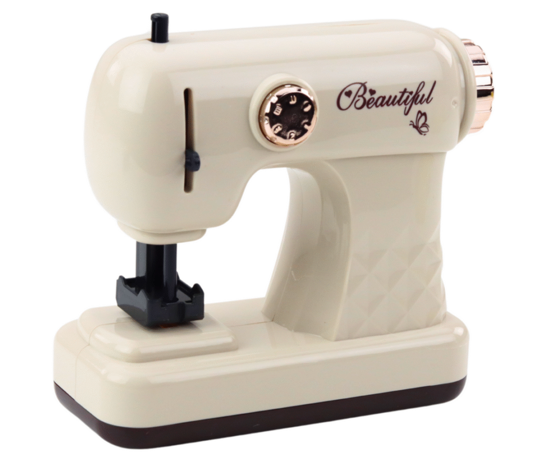 Üksikasjad mänguõmblusmasina hiirega – valgus- ja heliefektidega, roosa ja musta disainiga.