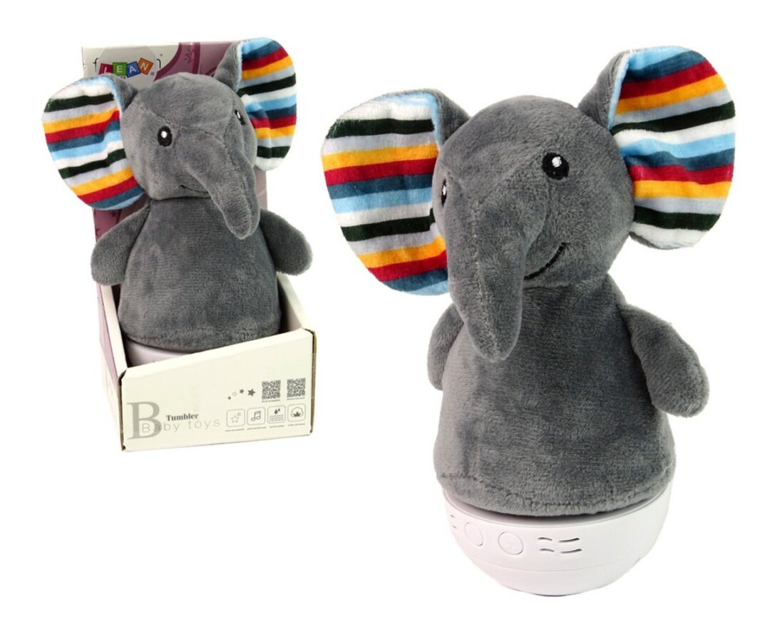 Tantsiv elevant-lamp muusikaga karbis, pehme ja sõbralik elevandi kujundusega.