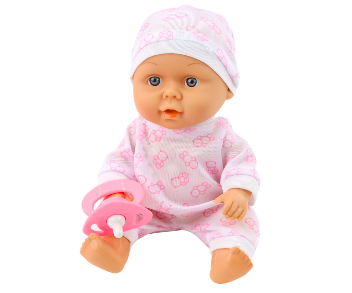 Portselan beebinukk, millel on roosa riietus ja lutike.