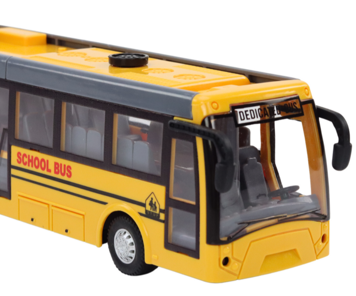Eesvaade Puldiga juhitav liigendiga koolibuss 37cm – kollane, detailne lähenemine esiosale