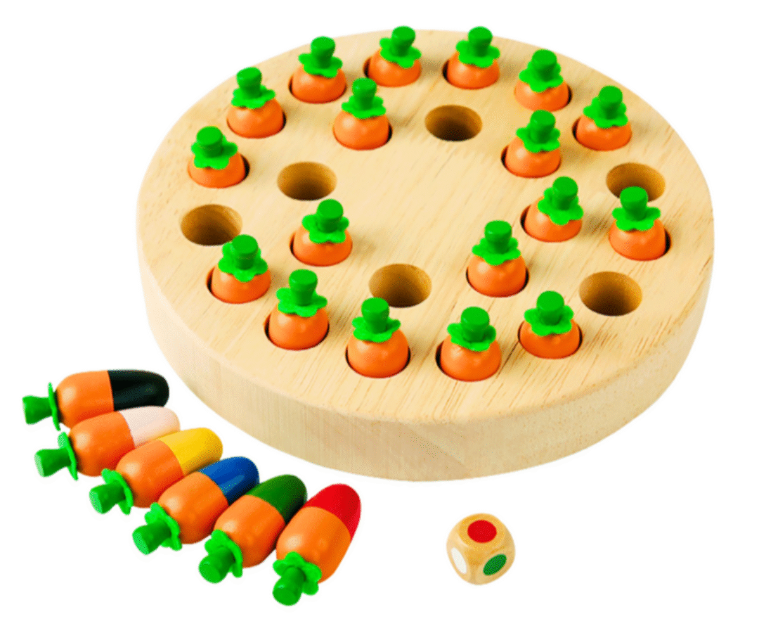 Laps tõstab porgandit mängulaualt, et meenutada õiget värvi.