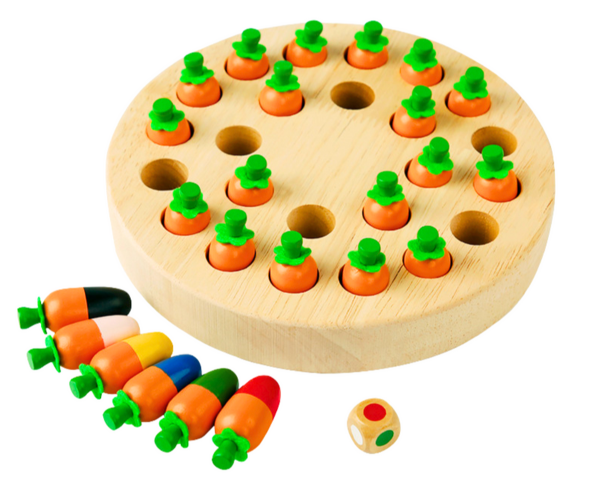 Laps tõstab porgandit mängulaualt, et meenutada õiget värvi.