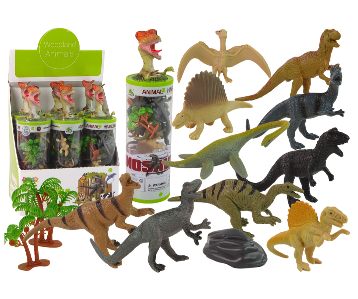 Väikesed dinosaurusekujukesed torukomplektis koos puude ja kiviga