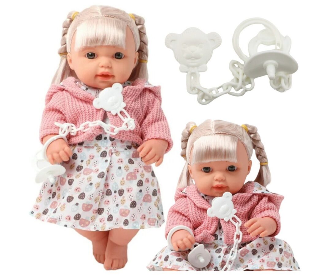 Beebinukk roosas kleidis ja kampsunis, 30 cm, istuvas asendis.