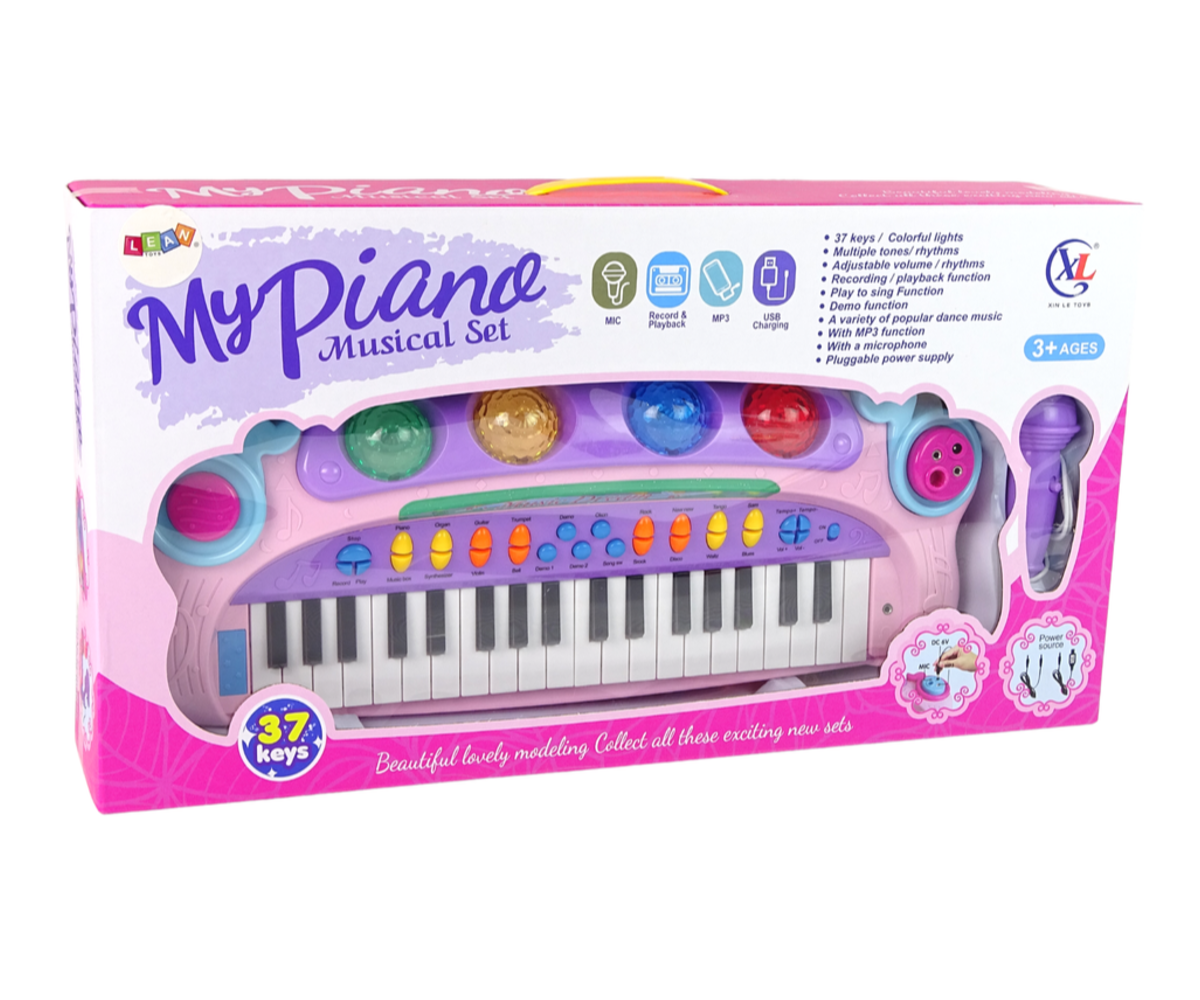 Pakend laste süntesaatorile mikrofoniga 37 klahvi ja MP3 – roosa, sisaldab informatsiooni mudeli kohta.