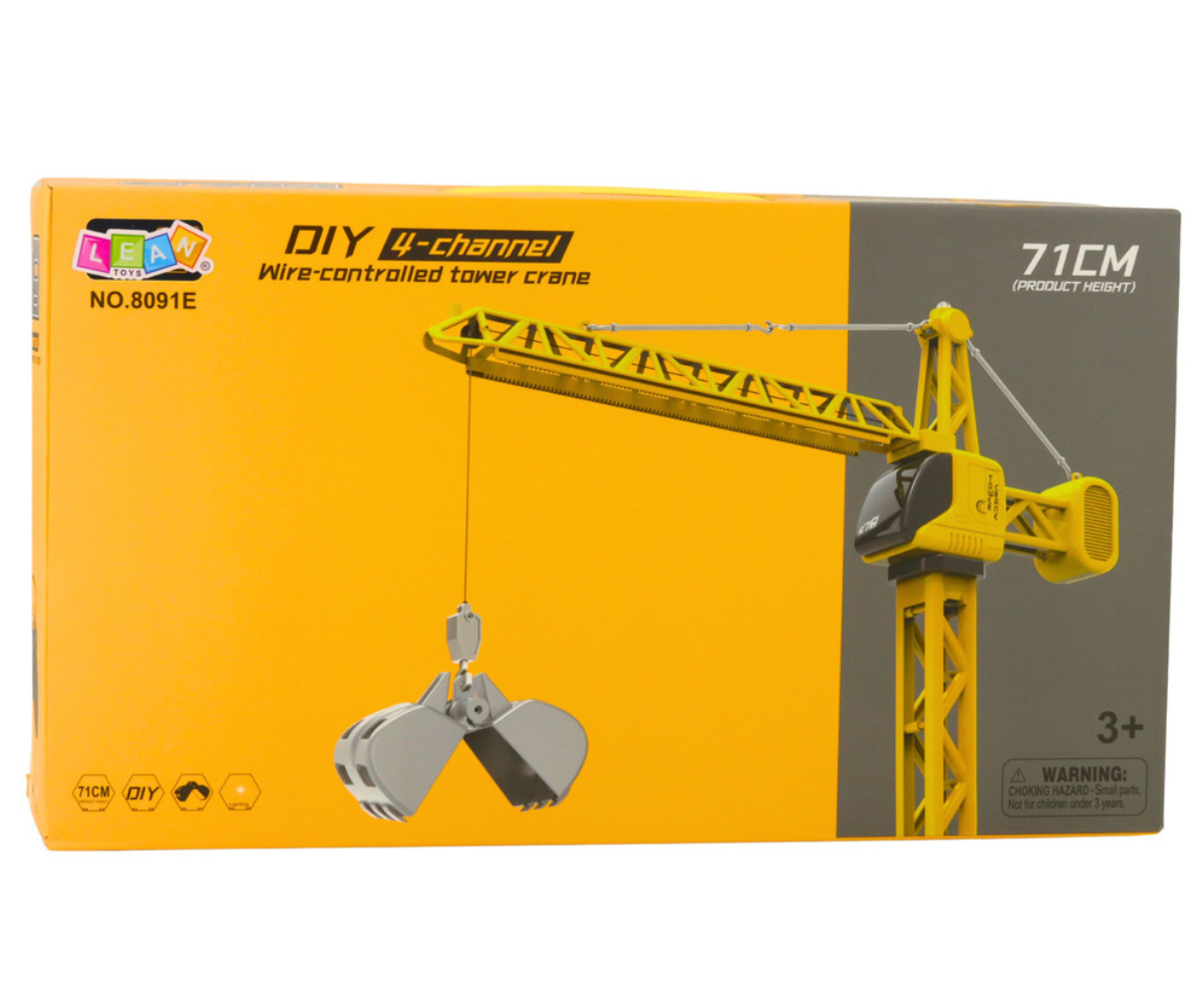 Kollane 71 cm mängukraan juhtmega puldiga koduses mängukeskkonnas.