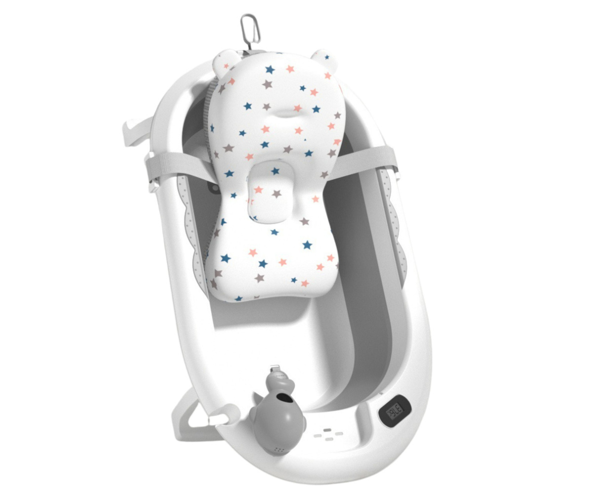 Pehme tähekestega madrats beebivanni sees, turvaline ja mugav tugi imikule.