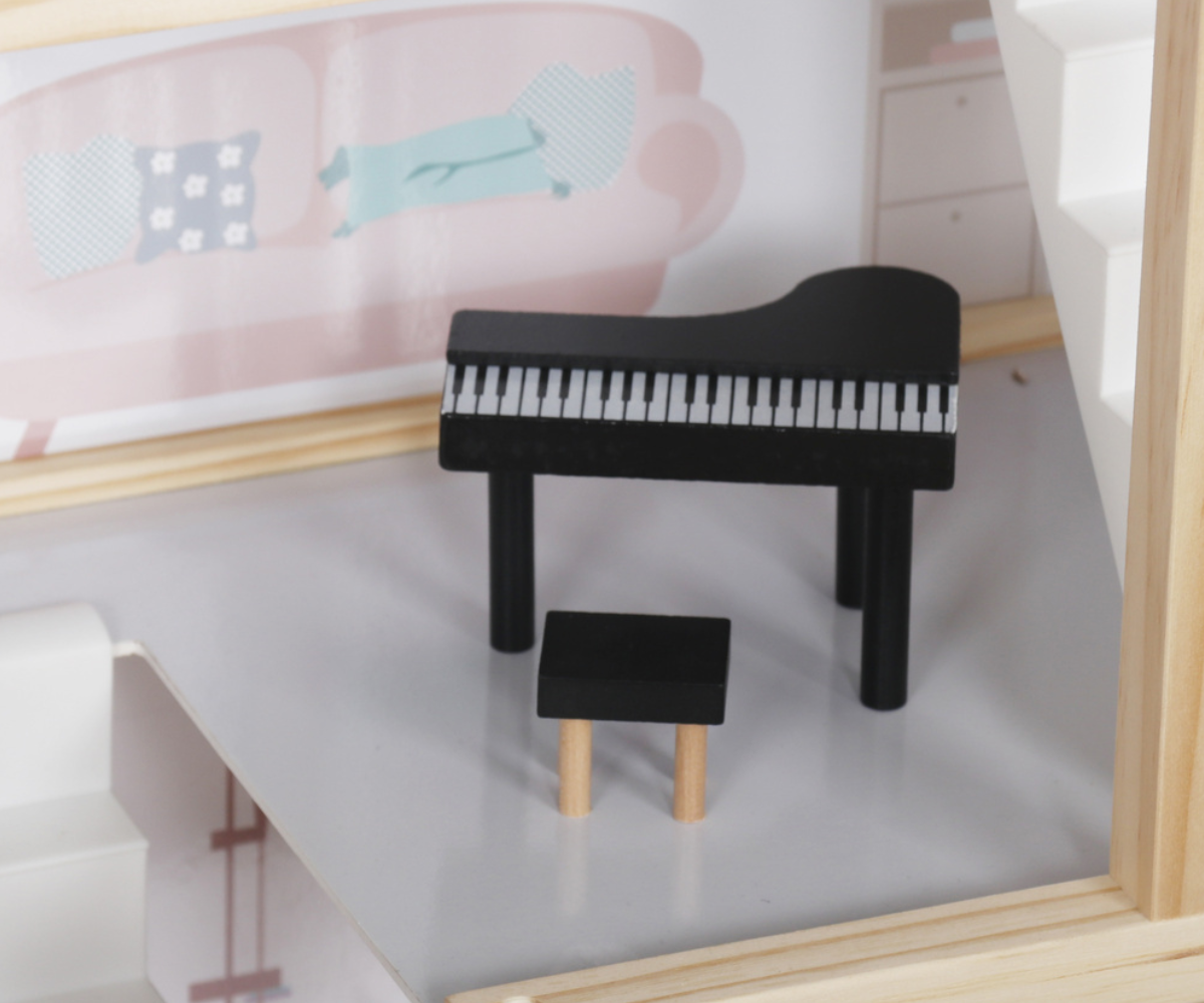 Pastelne nukumaja koos detailse mööbli ja väikeste aksessuaaridega.