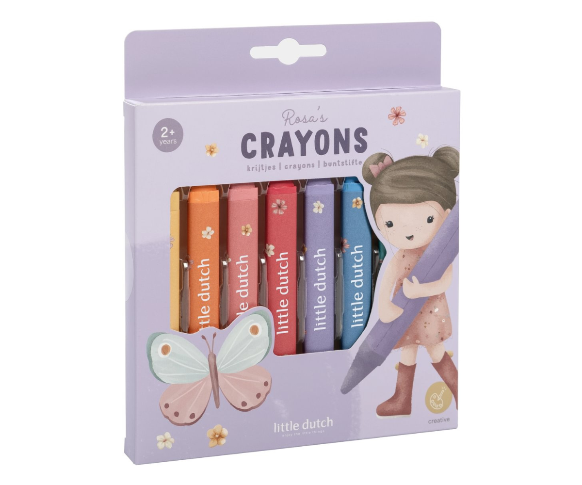 Laps hoiab käes kolmnurkset Little Dutch pastellroosat vahakriiti.