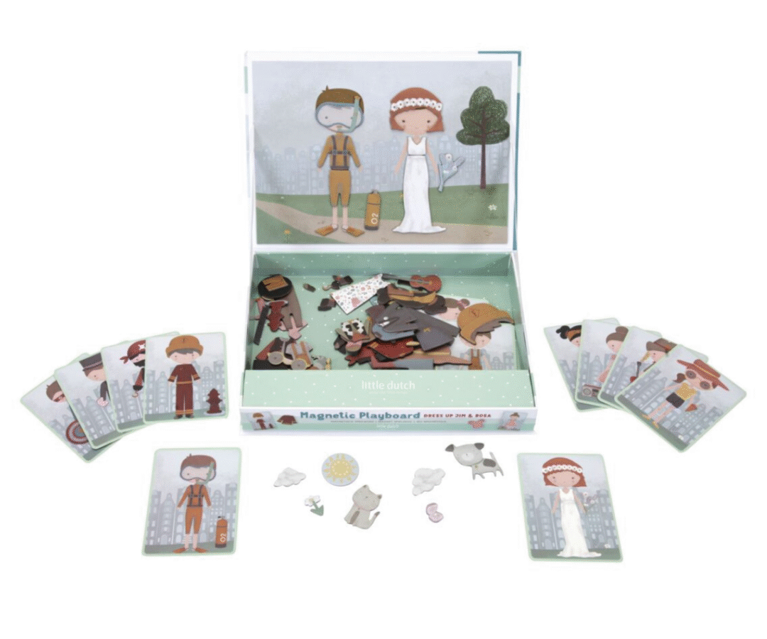 Jim’i ja Rosa erinevad riidekombinatsioonid mängulaual magnetitega kokku pandud.