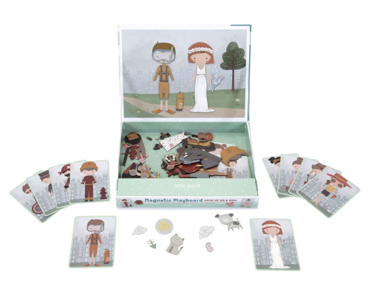 Jim’i ja Rosa erinevad riidekombinatsioonid mängulaual magnetitega kokku pandud.