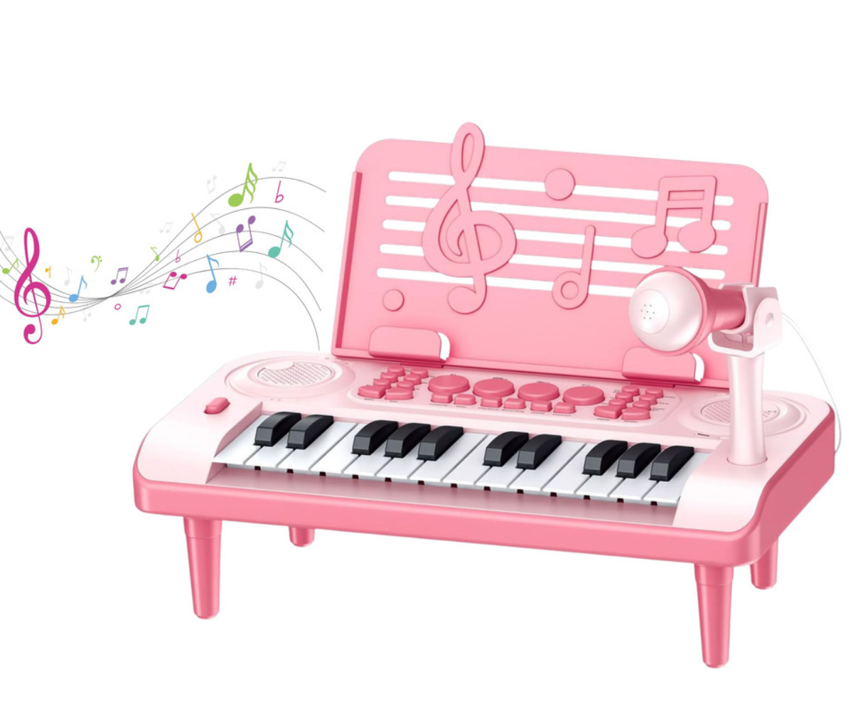 Süntesaatori juhtpaneel, kus on näha funktsiooninupud, noodialus ja mikrofonipesa.