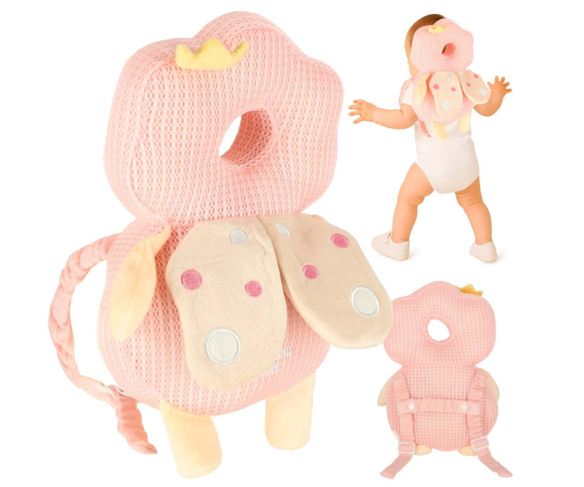 Roosa haldjakujuline beebide turvapadi seljakotina kõndima õppimiseks.