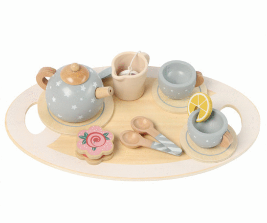 Kruzzel laste teekomplekt serveerimisalusel.