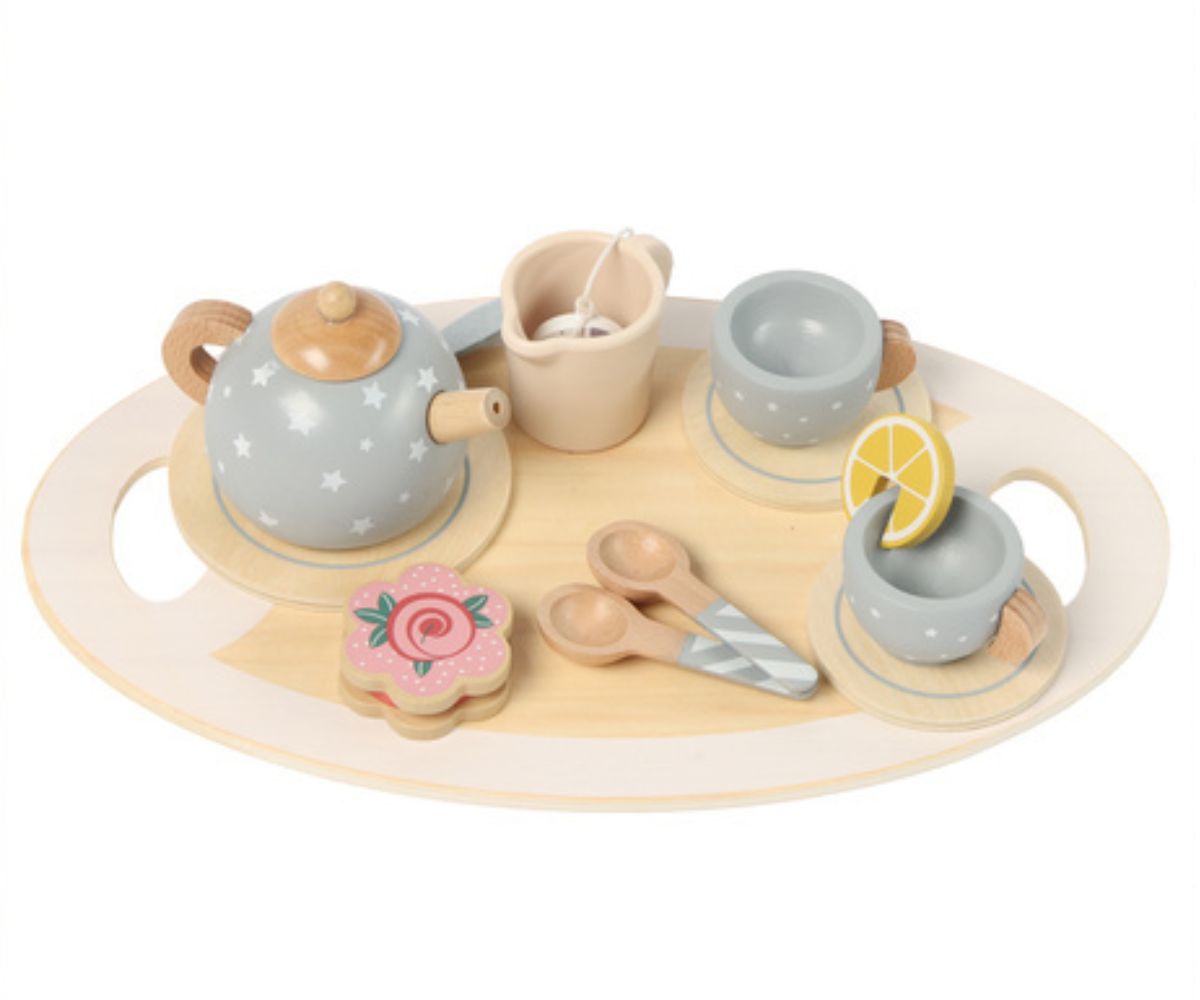 Kruzzel laste teekomplekt serveerimisalusel.