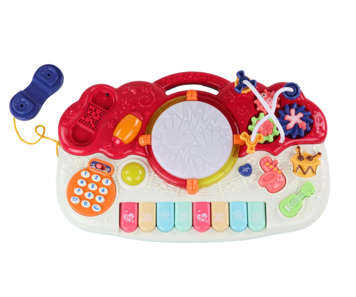 Laste hariv klahvpill trummi - helide ja valgusega nähtav pealisvaates, kus on selgelt eksponeeritud erinevad klahvid.