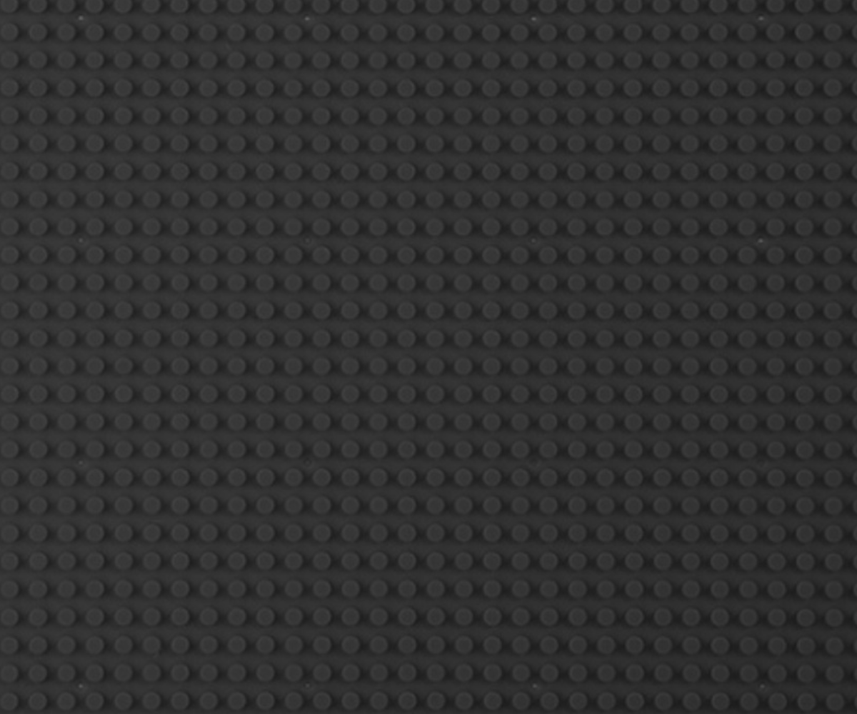 Plaadi serva ja nurga detailvaade – kvaliteetne ja tugev plastmaterjal.