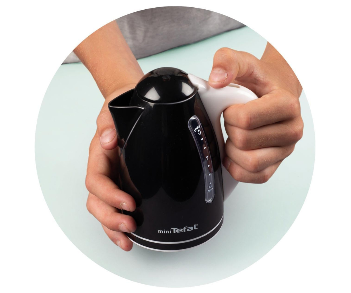 Veekeetja külgvaade koos lülitiga – detailne Tefal Express koopia.