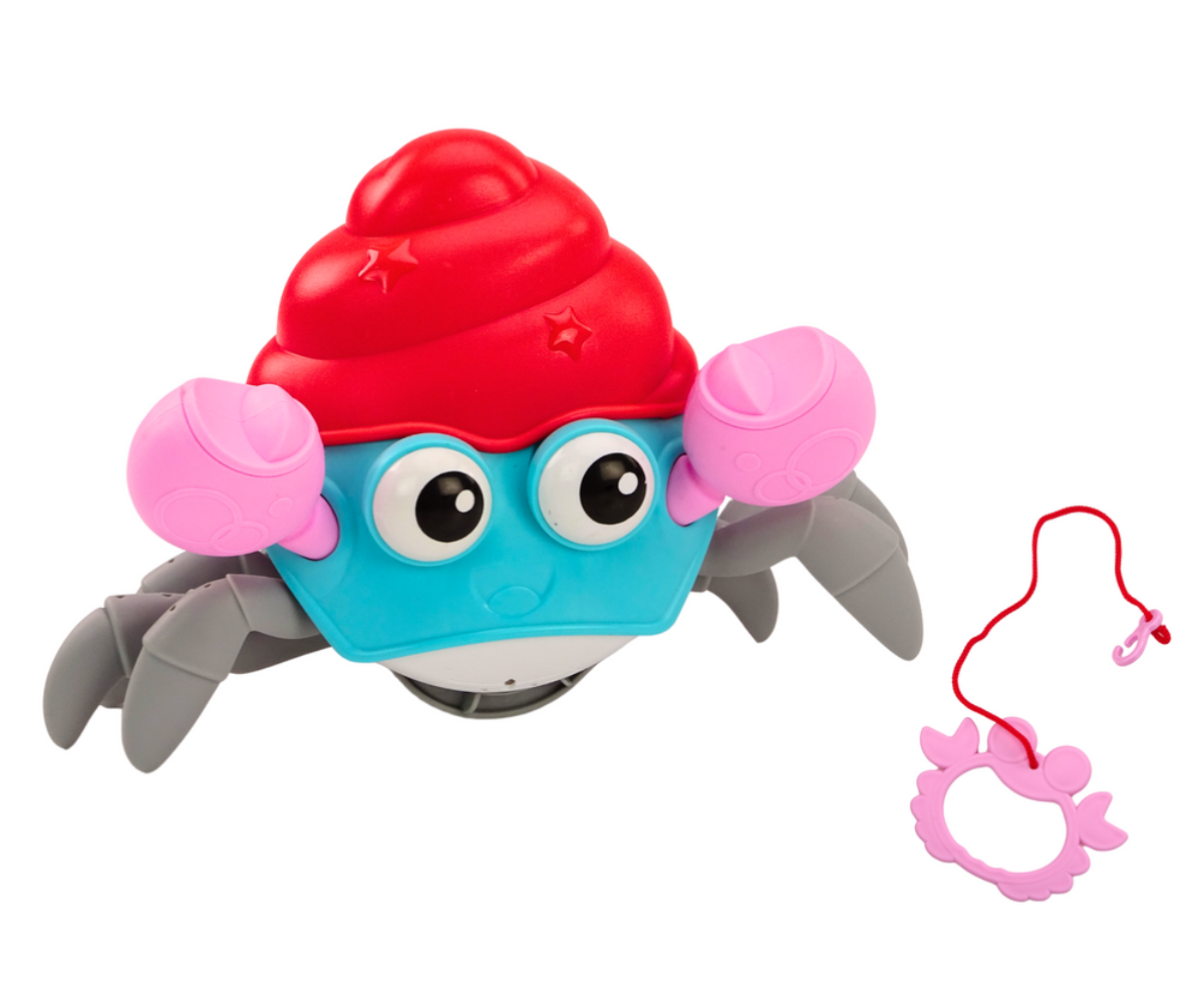 Laps vedamas krabi nööriga mööda põrandat.