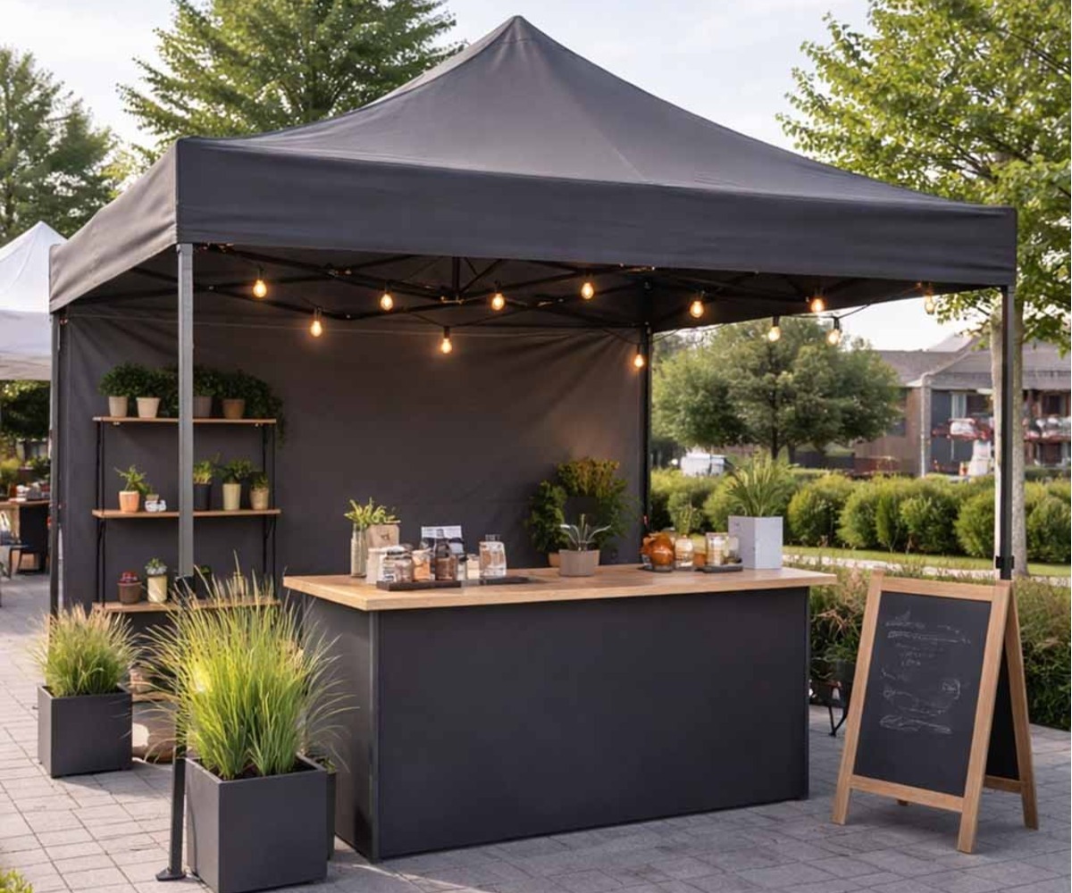 Aiapaviljon 3x3m must, kasutatud peotelgina toidu- ja jookide väljapanekuks.