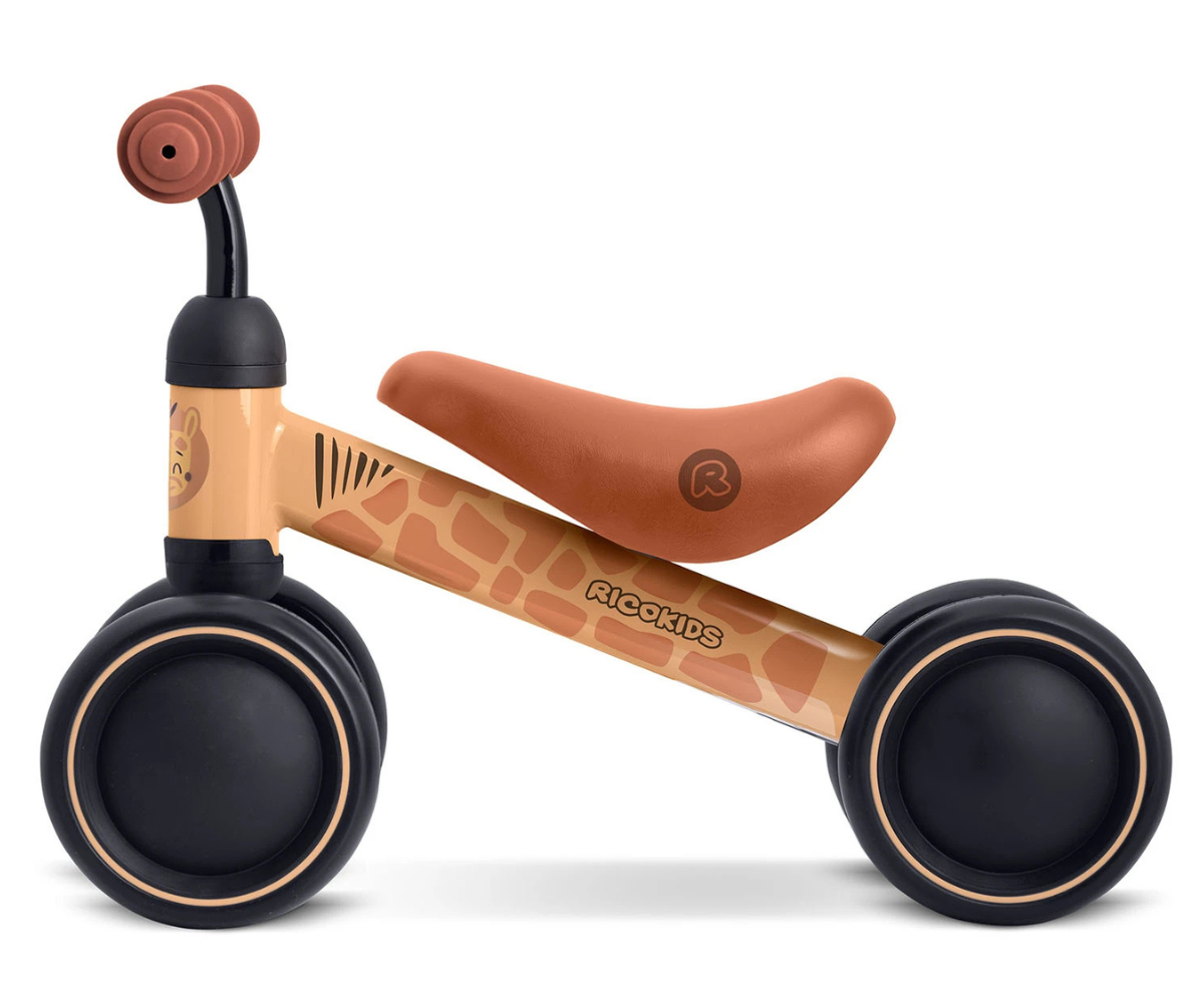 Kolme rattaga jooksuratas lapse tasakaalu ja liikumisoskuse toetamiseks