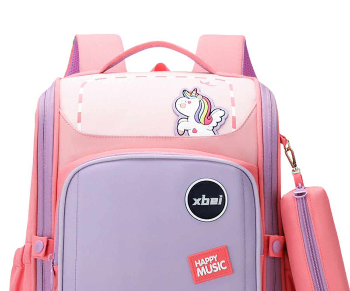 Roosa ükssarviku koolikott lapsele avara sahtli ja küljetaskutega