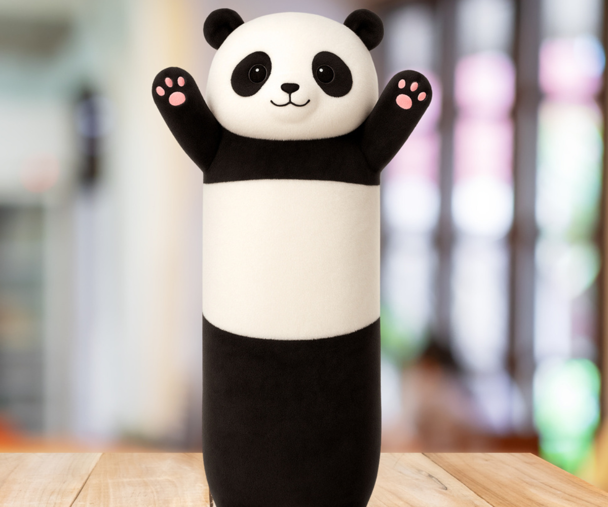 Mustvalge panda plüüspadi roosade detailidega lapse tuppa või diivanile