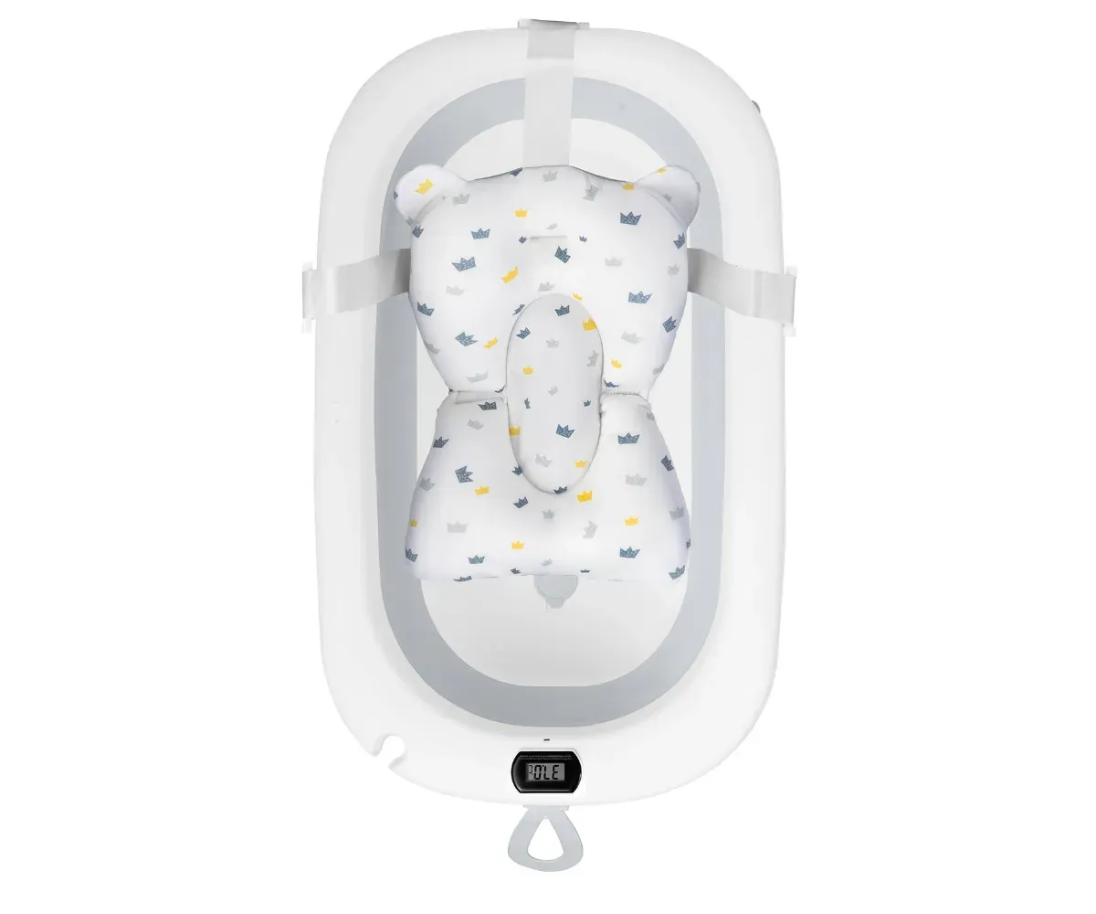 Beebivanni padi Ricokids – sinine / valge, vaadates padja ja beebivanni paigutust.