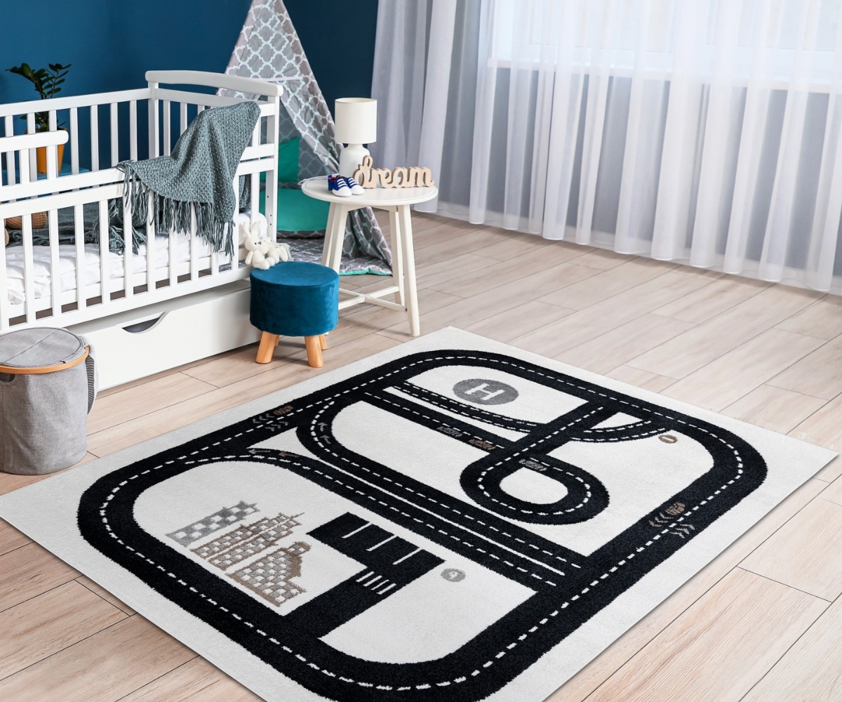 Lastetoas kasutamiseks mõeldud kreemjas autovaip FUN Ringtee koos mööbliga.