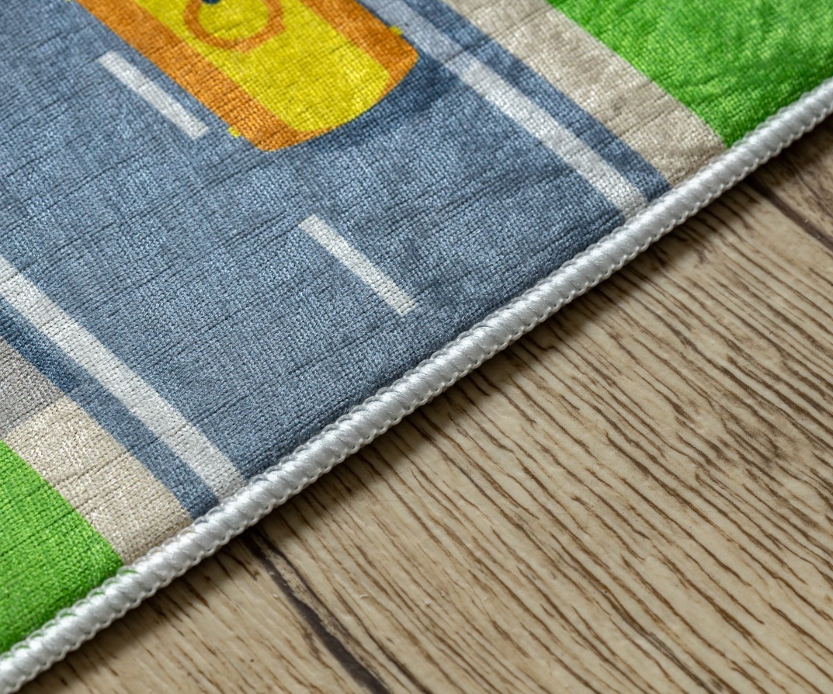 Lastetoa autovaip BAMBINO Linnatänavad, servad ja materjalid, mis tagavad libisemiskindluse.