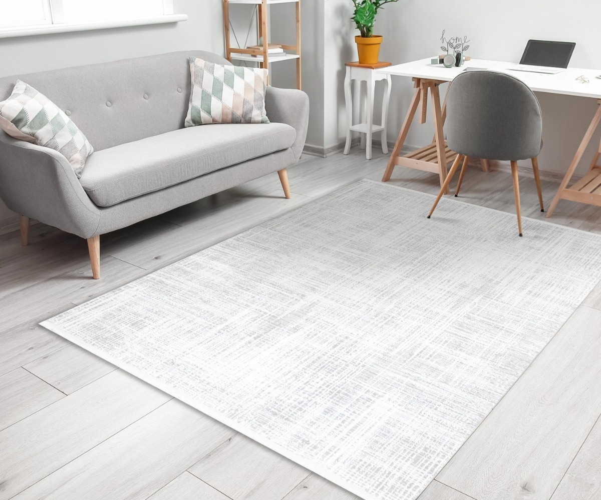 Kreemjas vaip DUKE A0357 elutoas koos modernse sisustusega
