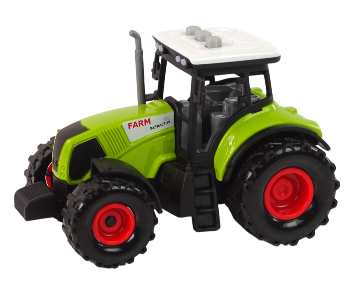 Mängutraktor kahe põllutöömasinaga – valguse ja heliga, esiplaanil detailne vaade traktori küljele