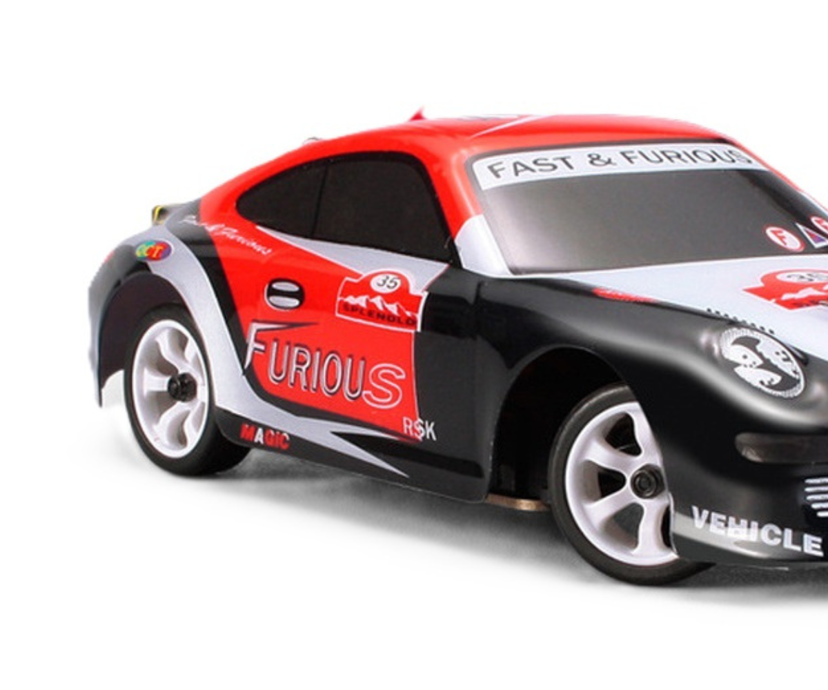 Puldiga driftiauto 18cm WLToys K969 – 4WD (30km/h) küljeline vaade