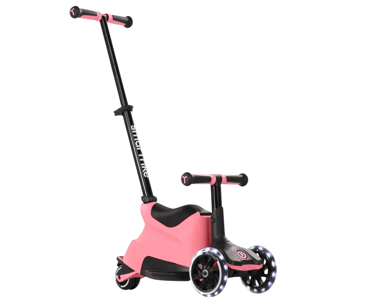 SmarTrike tõukeratas istmega Xtend Ride-on LED 5in1 heledas roosas värvitoonis, millel on neli ratast ja mugav istme osa.